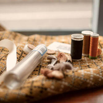 A selection of haberdashery items from Pearce's Pins. Threads, fabrics, ribbons and buttons.